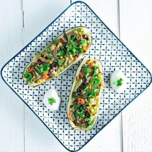 Кабачки, фаршировані овочами