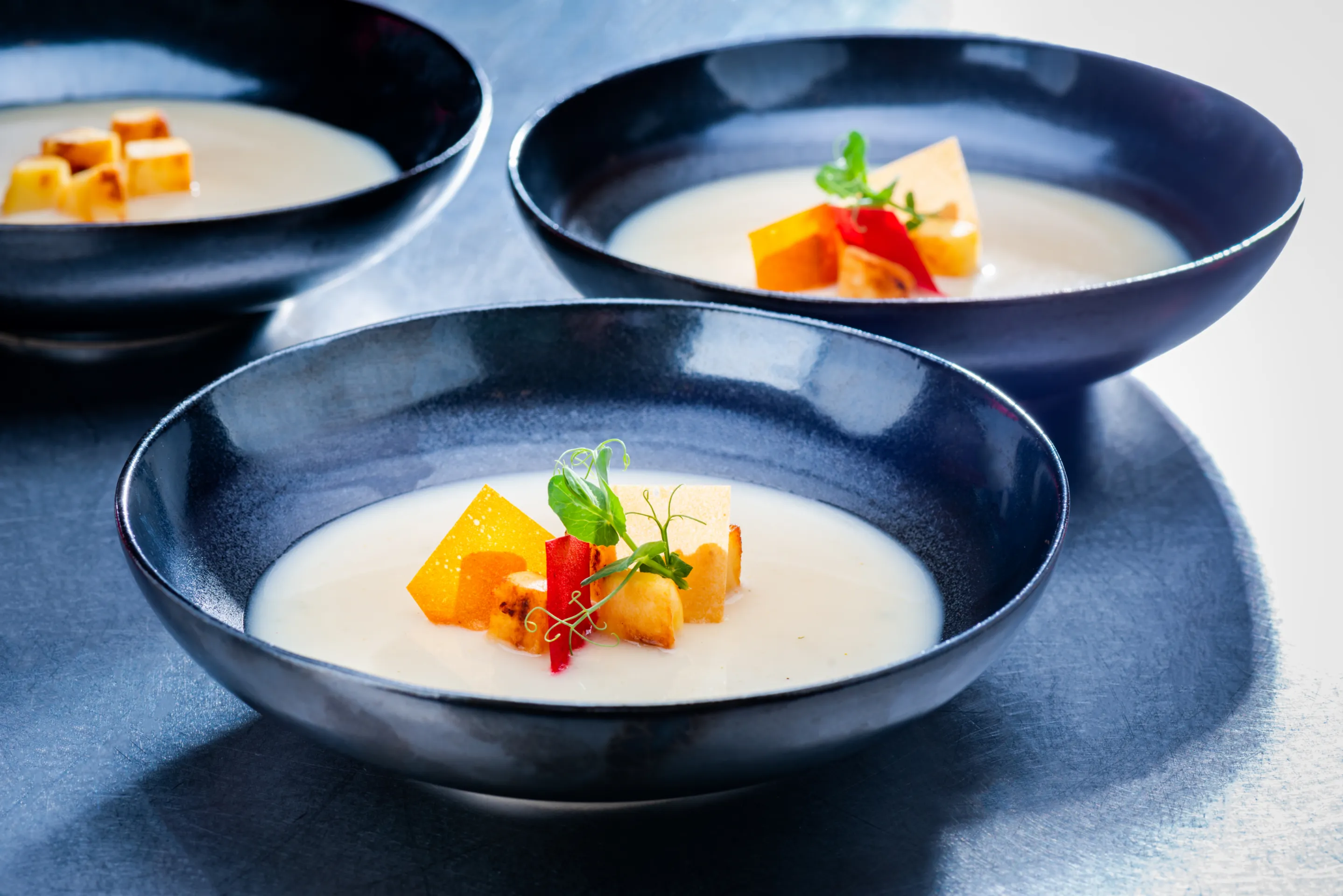 Celery soup with sliced parsnip