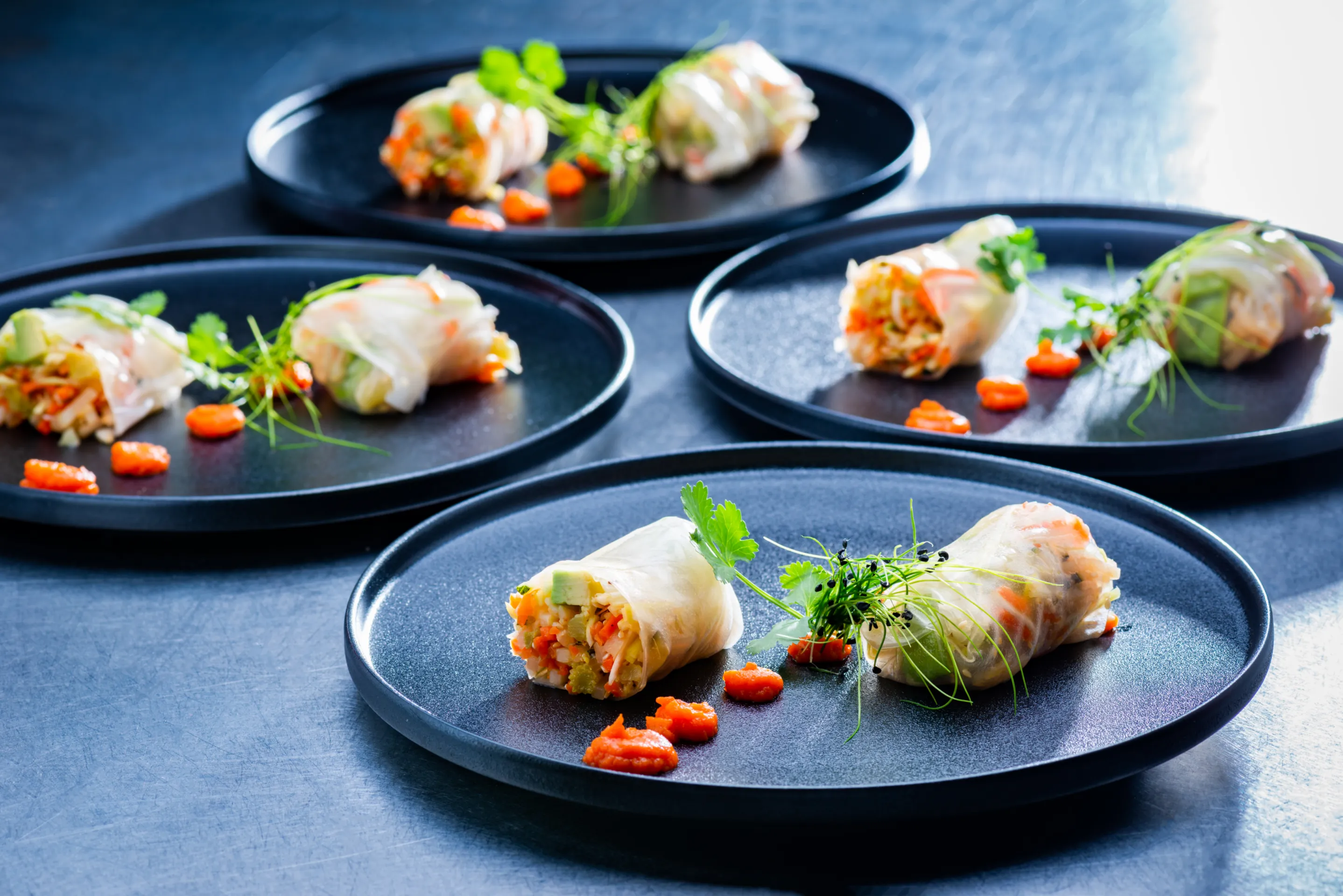 Vegan Christmas menu: Spring roll with a dot of carrot