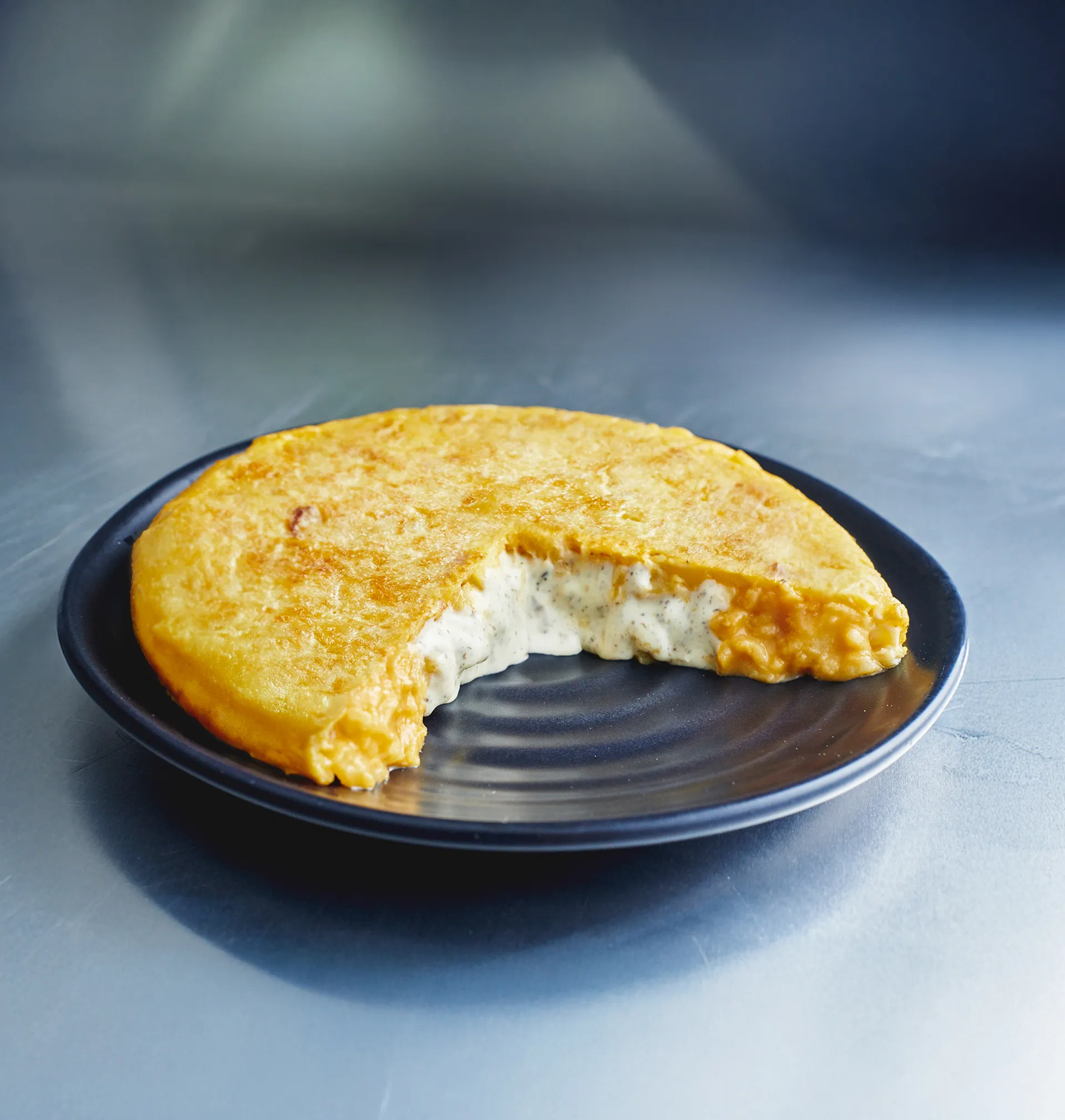 TORTILLA COULANT CON INTERIOR DE PURÉ DE PATATA Y TRUFA